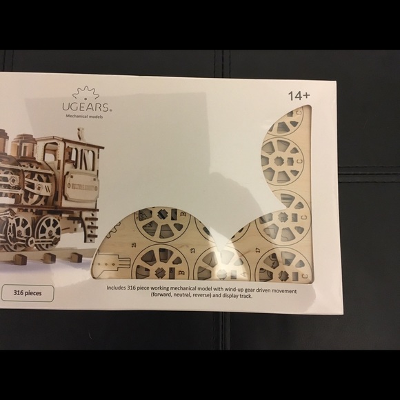 NEW New Disney Parks UGears Mechanical Model.
316 pieces. - Picture 3 of 7
